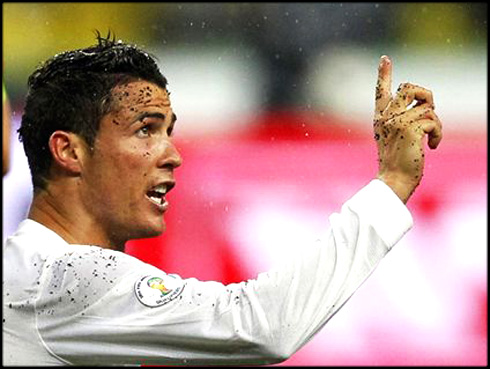 Cristiano Ronaldo with dirt on his face during Russia vs Portugal game, for the 2014 World Cup qualification stage