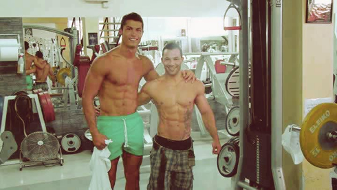 Cristiano Ronaldo on the gym training to be a body builder, showing his ripped naked body and big muscles with another bodybuilding friend, in 2012-2013