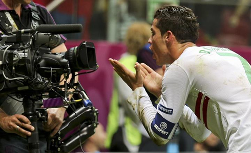 Cristiano Ronaldo sending kisses to the TV camera, after scoring a goal for Portugal