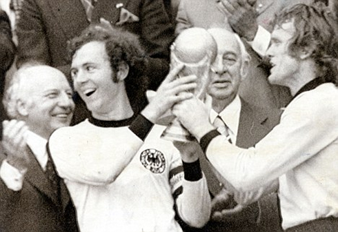 Franz Beckenbauer lifting the World Cup trophy in 1974, for Germany Deutschland