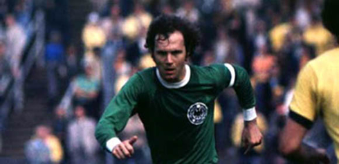 Franz Beckenbauer playing for Germany Deutschland, in a green classic jersey, shirt and uniform