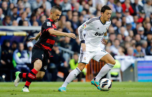 Mesut Ozil with a new look, playing for Real Madrid in 2012-2013