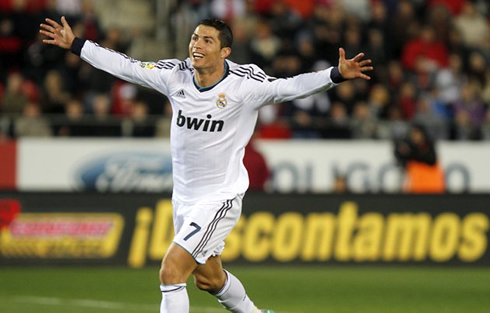 Cristiano Ronaldo starting to run around, with his arms wide open, after extending Real Madrid lead against Mallorca