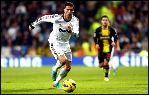 Cristiano Ronaldo chasing the ball as if his life depended on it, in Real Madrid vs Zaragoza, for La Liga 2012-2013