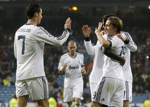 Cristiano Ronaldo giving congratulations to Luca Modric, for his first goal scored for Real Madrid, in La Liga win against Zaragoza, by 4-0 in 2012-2013