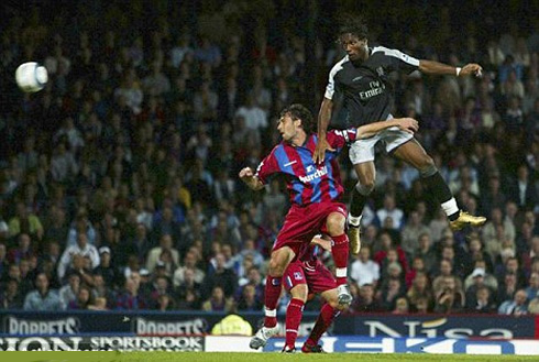 Didier Drogba big jump in the air to head a ball, in a game for Chelsea FC