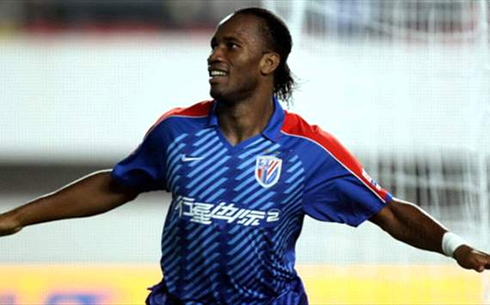 Didier Drogba celebrating his first goal for Shanghai Shenhua