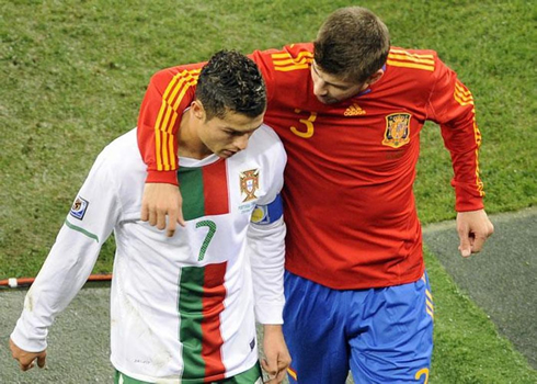 Gerard Piqué comforting Cristiano Ronaldo after Spain eliminated Portugal