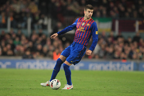Gerard Piqué playing for Barcelona, in 2012-2013