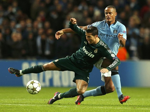 Cristiano Ronaldo being fouled and sent to the ground by Vincent Kompany, in Manchester City 1-1 Real Madrid, in 2012-2013