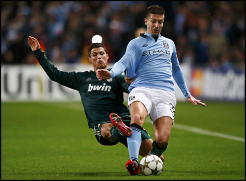 Cristiano Ronaldo hard tackle from behind, in Manchester City vs Real Madrid, at the UEFA Champions League in 2012-2013