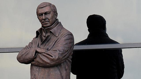 Sir Alex Ferguson new statue from Man Utd, at Old Trafford, with a strong posture and serious look, in 2012