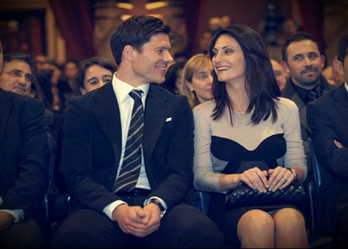 Xabi Alonso and his wife/girlfriend Nagore Aramburu, attending a public ceremony and event