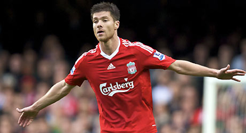 Xabi Alonso celebrating a goal for Liverpool, in 2007-2008