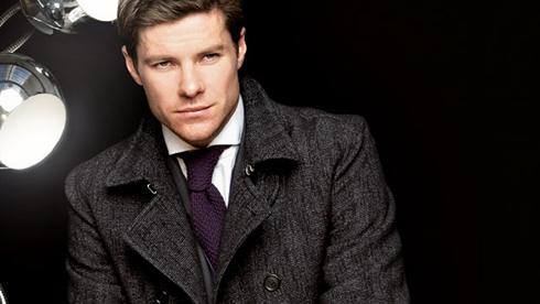 Xabi Alonso fashion photo, wearing a jacket and a purple tie