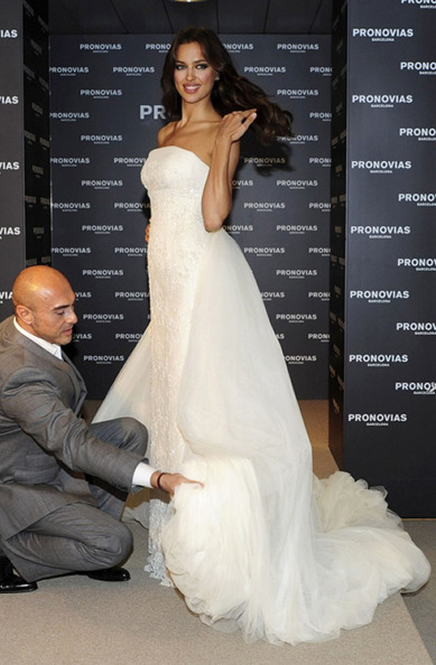 Irina Shayk trying wedding dresses and a white bridal gown
