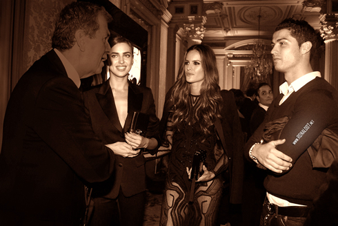 Cristiano Ronaldo standing next to two top models from Victoria's Secret, Irina Shayk and Izabel Goulart, in 2012-2013