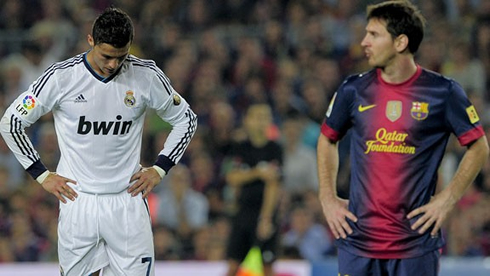 Cristiano Ronaldo and Lionel Messi facing each other, in Real Madrid vs Barcelona, in 2012-2013