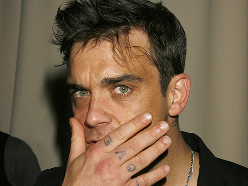 Robbie Williams disgracing himself after drugs abuse