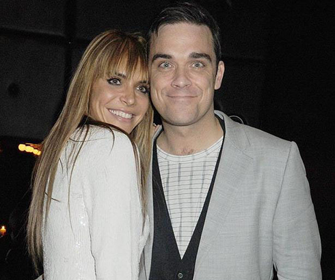 Robbie Williams looking happy with his wife Ayda Field, in 2012-2013
