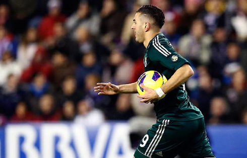 Karim Benzema running back, after scoring a goal for Real Madrid, in Spanish League 2012-2013