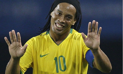 Ronaldinho asking for apologies in a Brazilian National Team jersey number 10