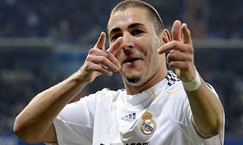 Karim Benzema pretending he is shooting someone, after netting another goal for Real Madrid