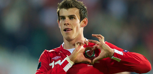 Gareth Bale making the heart symbol with his hands, to show his love for his home country, Wales