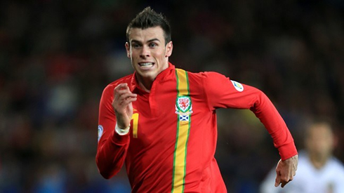 Gareth Bale sprinting, in a game for Wales, in 2012-2013