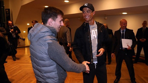 Cristiano Ronaldo and Lionel Messi shaking hands before the FIFA Balon d'Or 2012 ceremony and gala