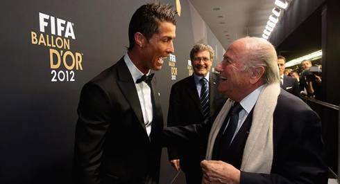 Cristiano Ronaldo big laugh with FIFA president, Joseph Blatter, at the FIFA Balon d'Or 2012