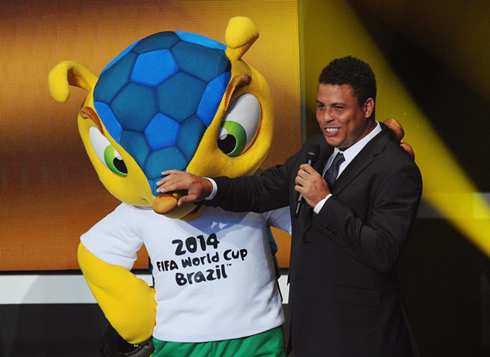 Brazilian Ronaldo, next to the FIFA World Cup 2014 mascot