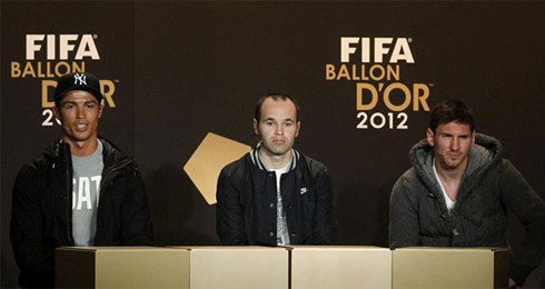 Cristiano Ronaldo, Iniesta and Lionel Messi, seated next to each other, at the FIFA Balon d'Or 2012