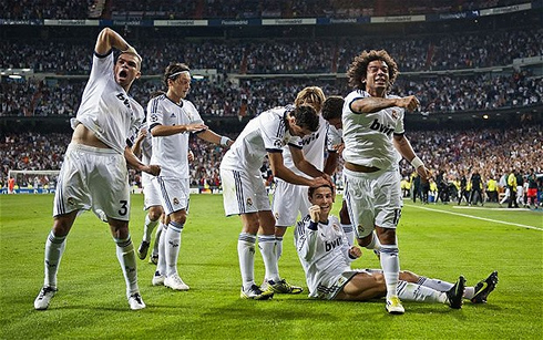 Real Madrid players effusively celebrating a victory in 2012