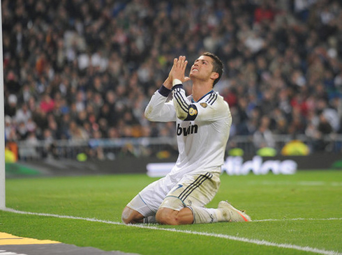 Cristiano Ronaldo praying to God, during a soccer match in 2013