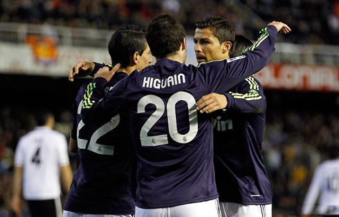 Cristiano Ronaldo with Angel di María and Gonzalo Higuaín, celebrating Real Madrid goal against Valencia, in La Liga 2013