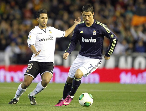 Cristiano Ronaldo changing directions during a soccer game for Real Madrid in 2013