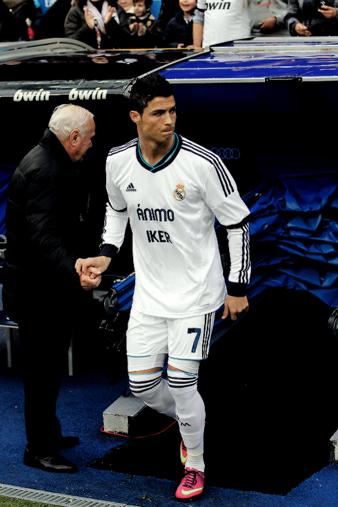 Cristiano Ronaldo showing his support for Iker Casillas, with Animo Iker written on his jersey, in 2013