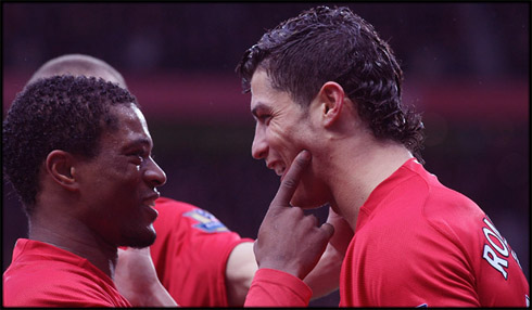 Patrice Evra celebrating goal with Ronaldo, in Man Utd 2008-2009