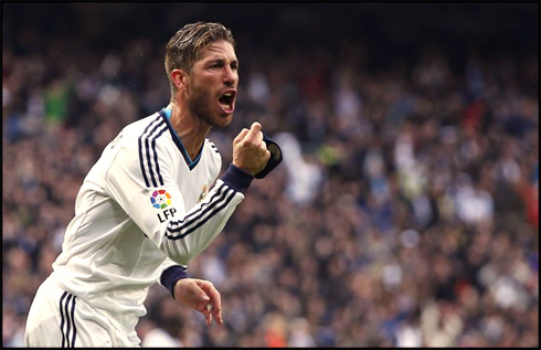 Sergio Ramos taking off his captain armband, during the goal celebrations of Real Madrid vs Barcelona, from a clasico in 2013