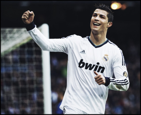Cristiano Ronaldo celebrating Real Madrid victory, with big smile on his face, in 2013