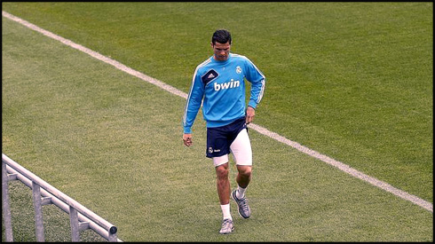 Cristiano Ronaldo with a left leg thigh injury, walking out of the Real Madrid training ground, in April 2013