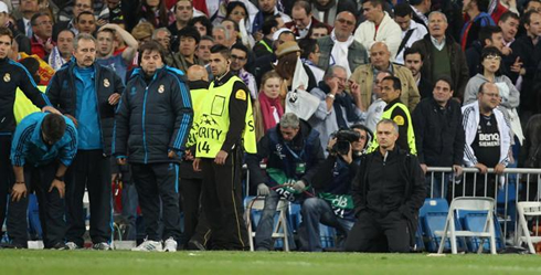 José Mourinho on his knees during the penalty shoot-out decision between Real Madrid and Bayern Munich, for the Champions League 2012