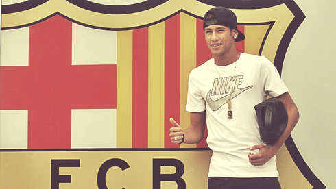 Neymar arriving to Barcelona, on his presentation day, in front of the club's badge