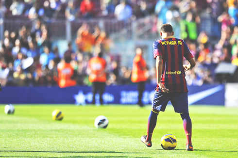 Neymar wearing a numberless Barcelona shirt and jersey, on his presentation act