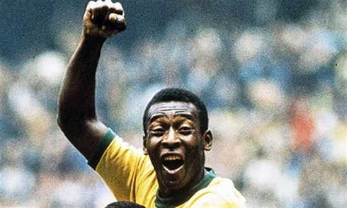 Pelé raising his hand on a goal celebration for Brazil