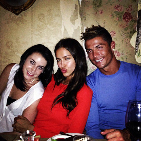 Cristiano Ronaldo and Irina Shayk, with a female friend