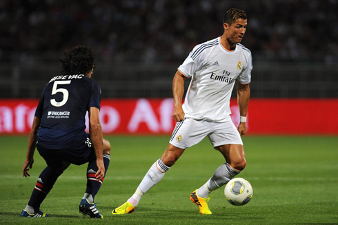 Cristiano Ronaldo biting his own tongue, in Lyon vs Real Madrid