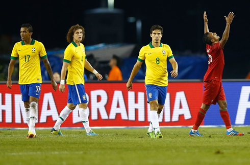 Nani raising his arms to the air in despair, during Brazil vs Portugal