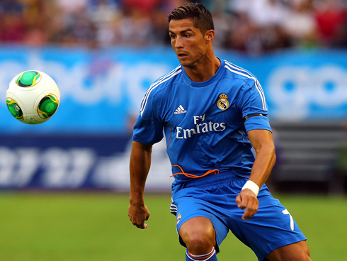 Cristiano Ronaldo in a blue Real Madrid jersey and uniform, in 2013-2014